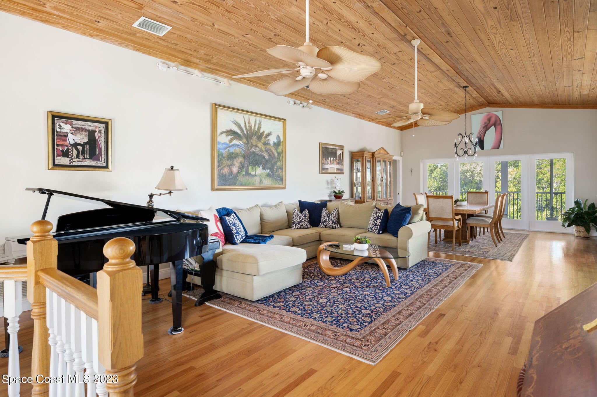 5280 95th Street Sebastian, FL 32958 - Photo 3 of 42 a living room with furniture and a wooden floor
