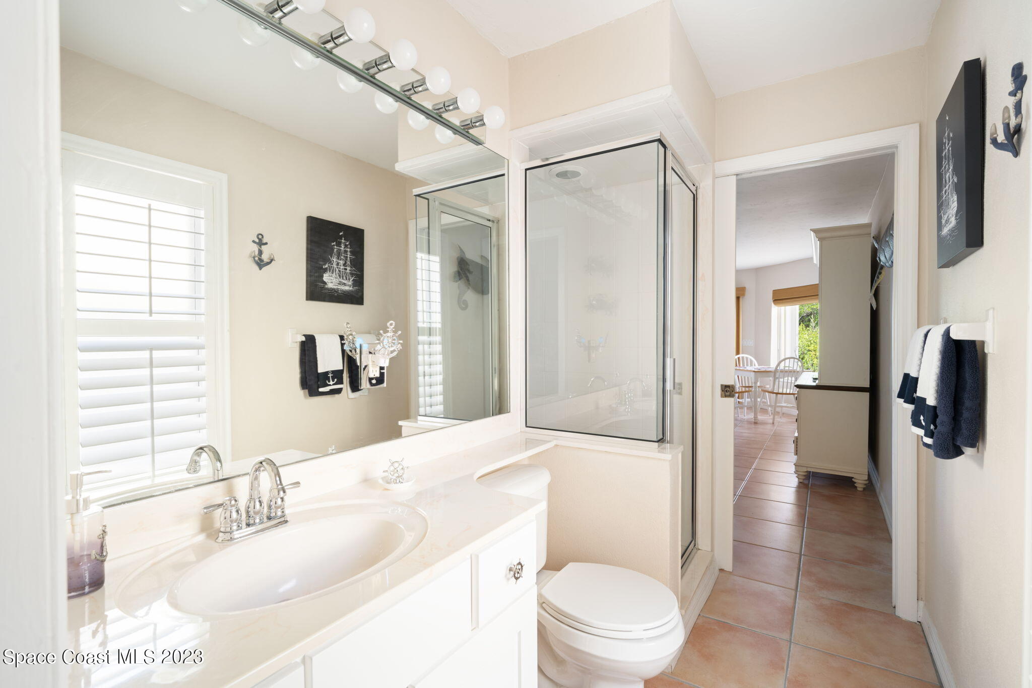 5280 95th Street Sebastian, FL 32958 - Photo 34 of 42 a bathroom with a sink toilet and shower