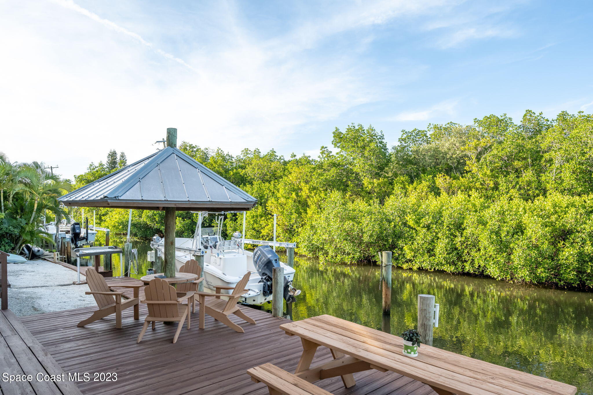 5280 95th Street Sebastian, FL 32958 - Photo 41 of 42 a view of a lake with a patio