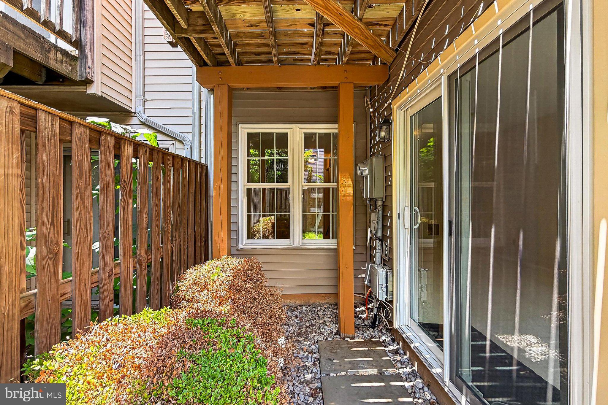 13157 Kidwell Field Road Herndon, VA 20171 - Photo 44 of 50 Charming outdoor nook with greenery.