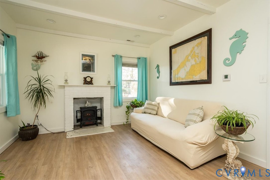 611 Jones Point Beach Road Laneview, VA 22504 - Photo 14 of 27 a living room with furniture and a fireplace
