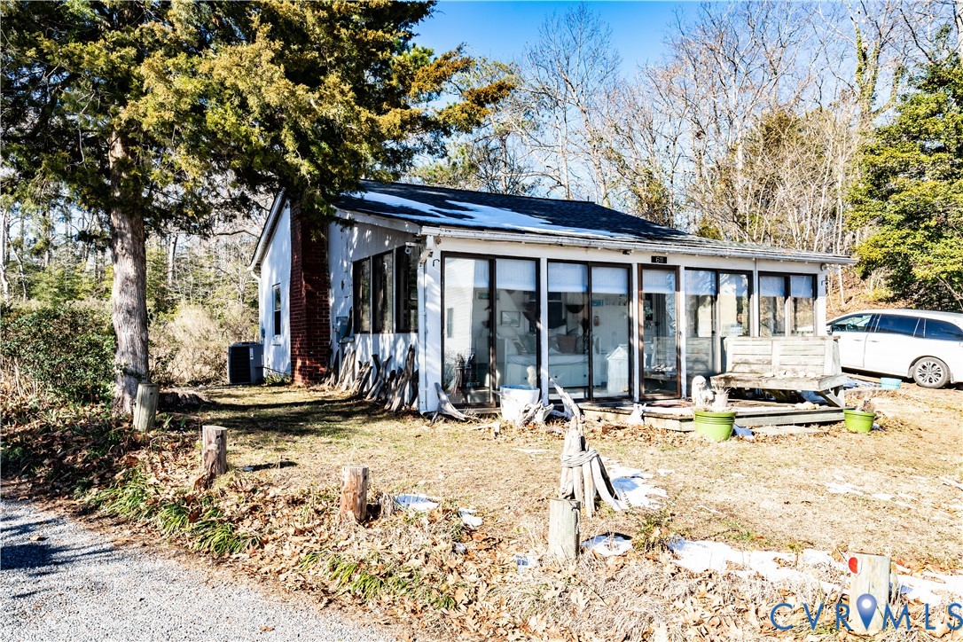 611 Jones Point Beach Road Laneview, VA 22504 - Photo 3 of 27 View of front of house with a sunroom