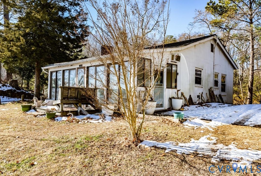 611 Jones Point Beach Road Laneview, VA 22504 - Photo 4 of 27 a view of a lounge chair and snow on the road