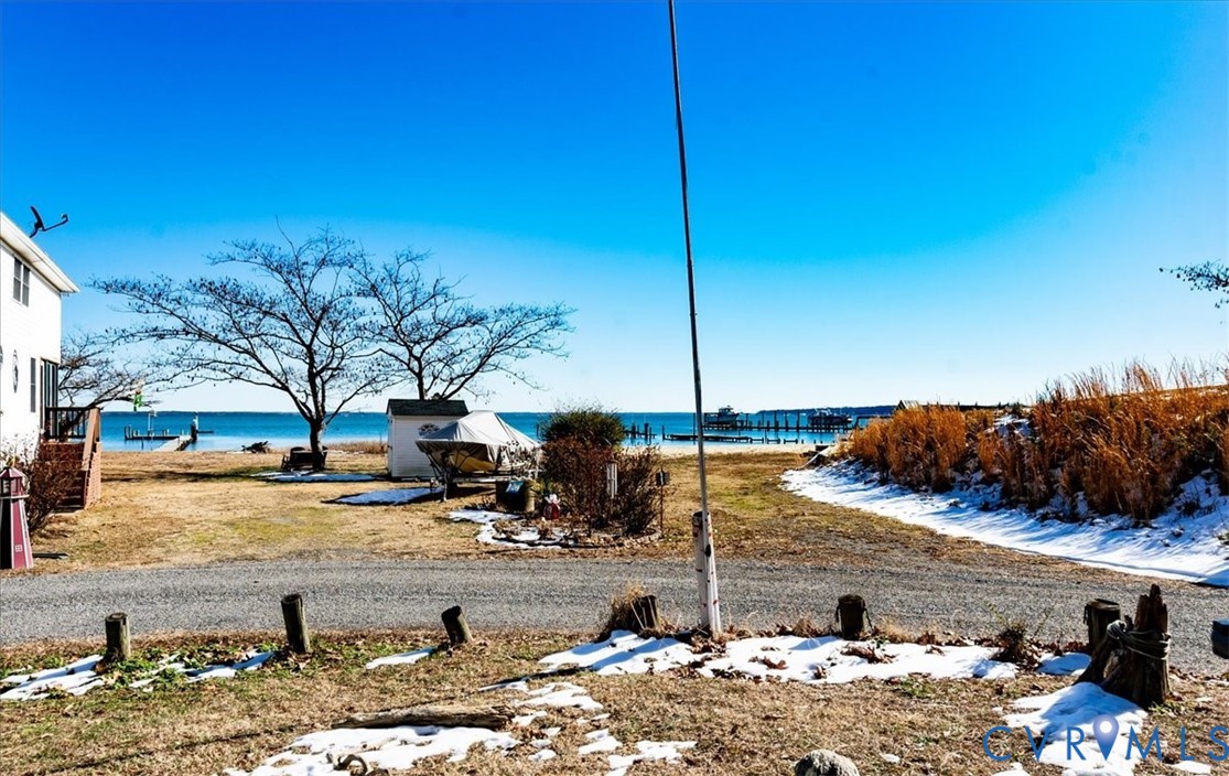 611 Jones Point Beach Road Laneview, VA 22504 - Photo 5 of 27 a view of a lake with a house