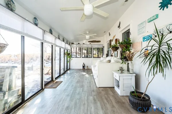 a view of living room with furniture and flat screen tv