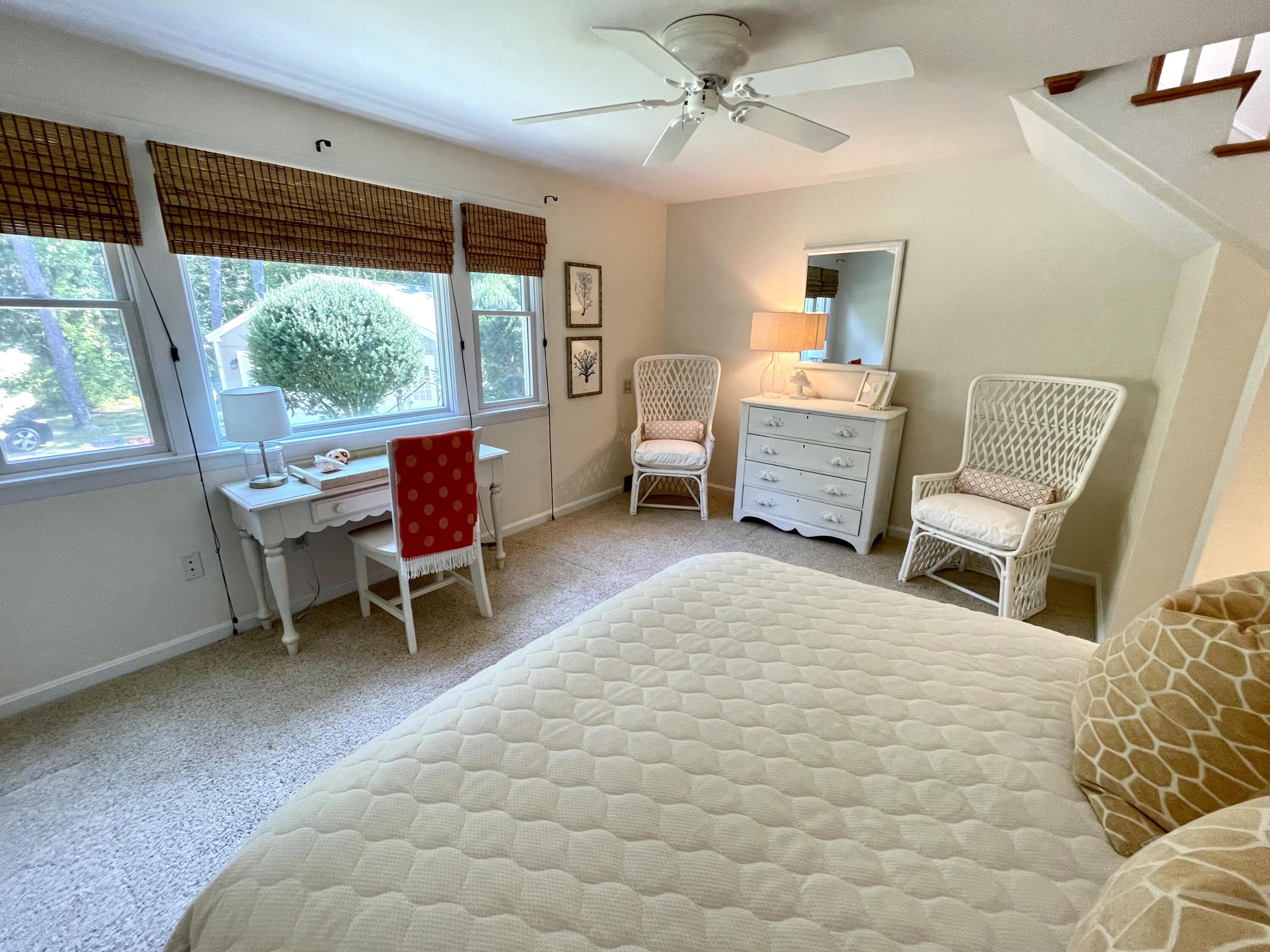 100 Bay Lane Centerville, MA 02632 - Photo 14 of 32 a bedroom with furniture and a large window