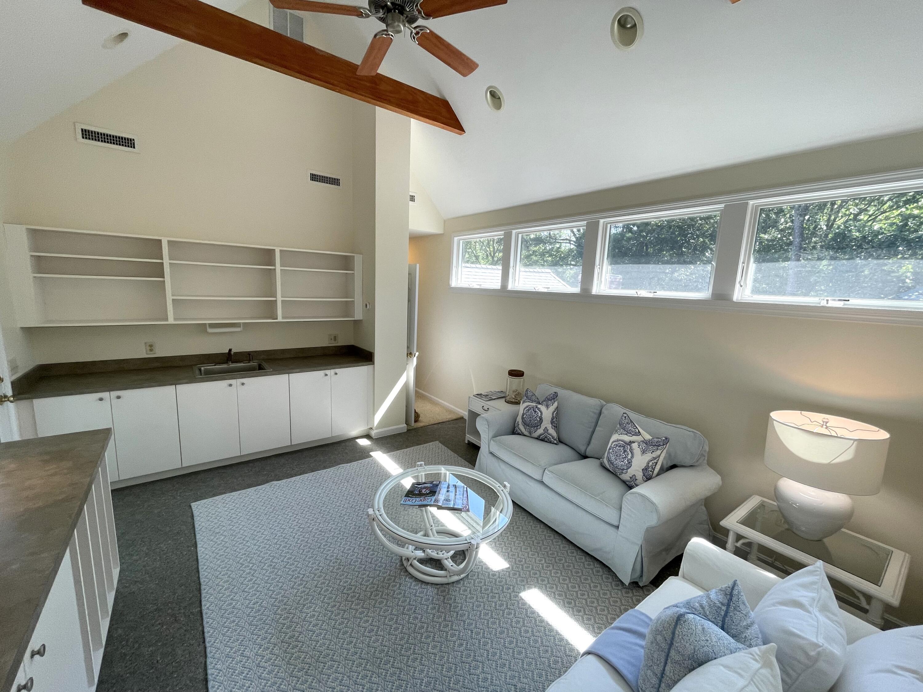 100 Bay Lane Centerville, MA 02632 - Photo 19 of 32 a living room with furniture and wooden floor