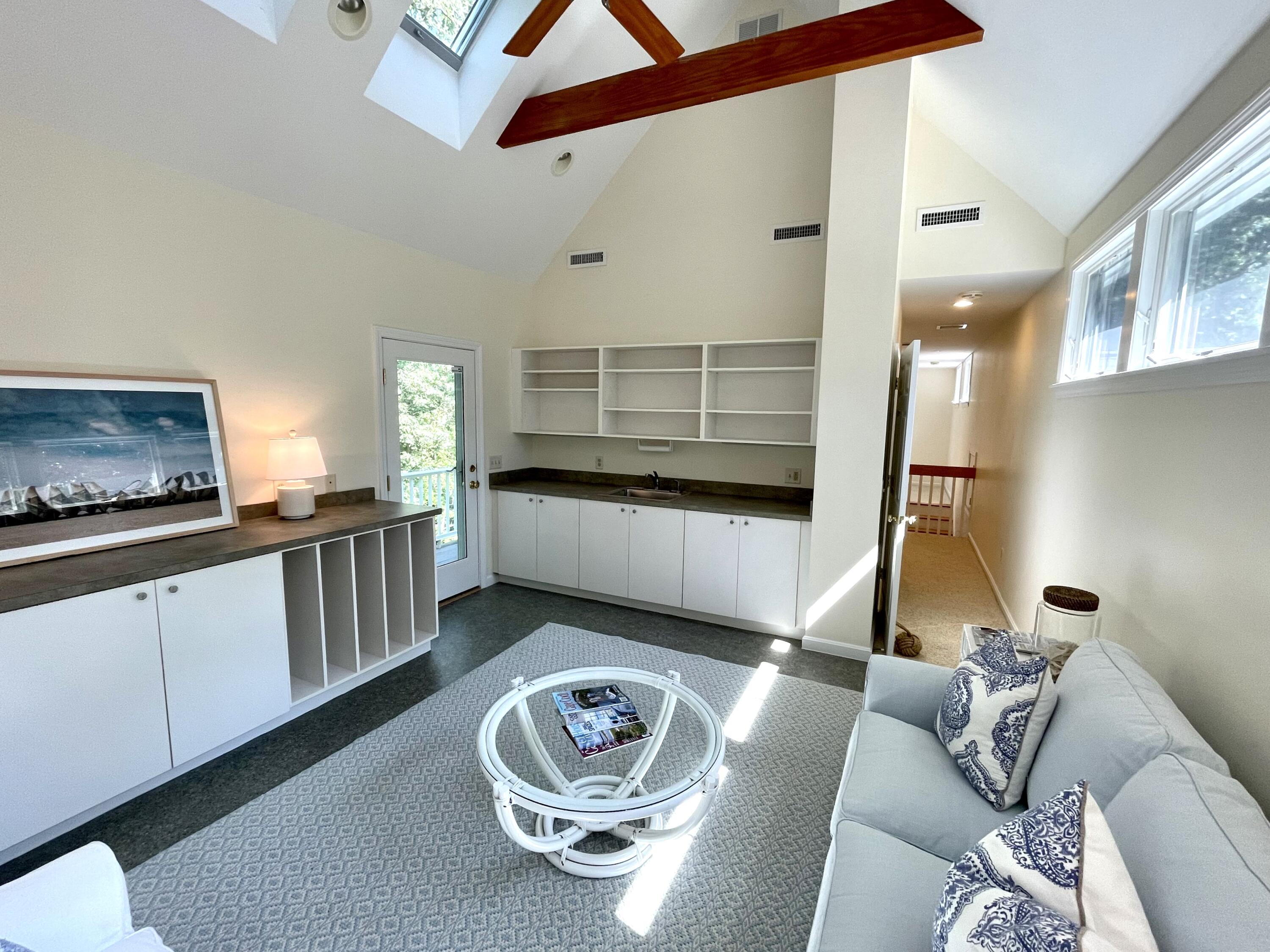 100 Bay Lane Centerville, MA 02632 - Photo 20 of 32 a living room with furniture and a wooden floor