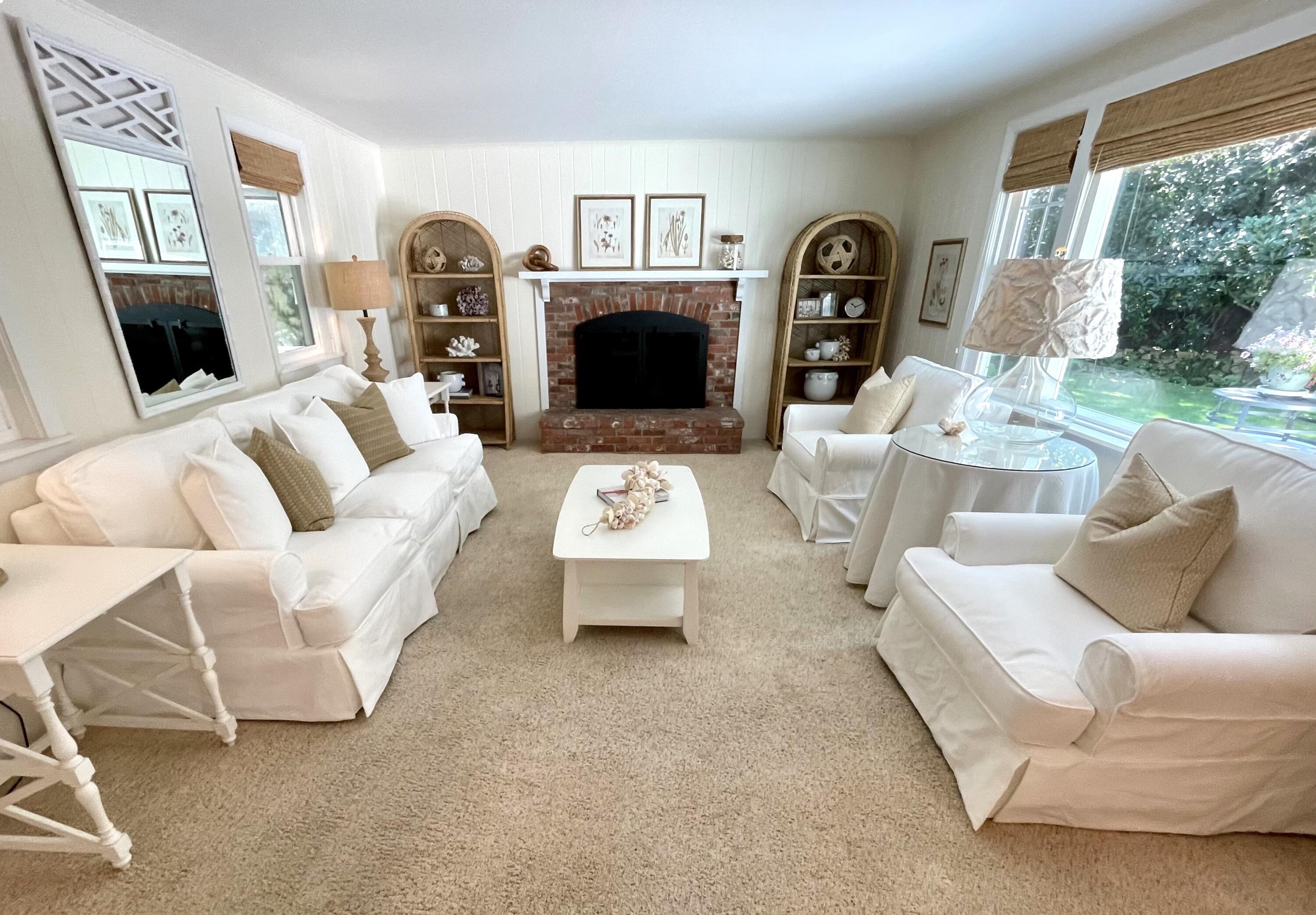 100 Bay Lane Centerville, MA 02632 - Photo 4 of 32 a living room with furniture and a fireplace