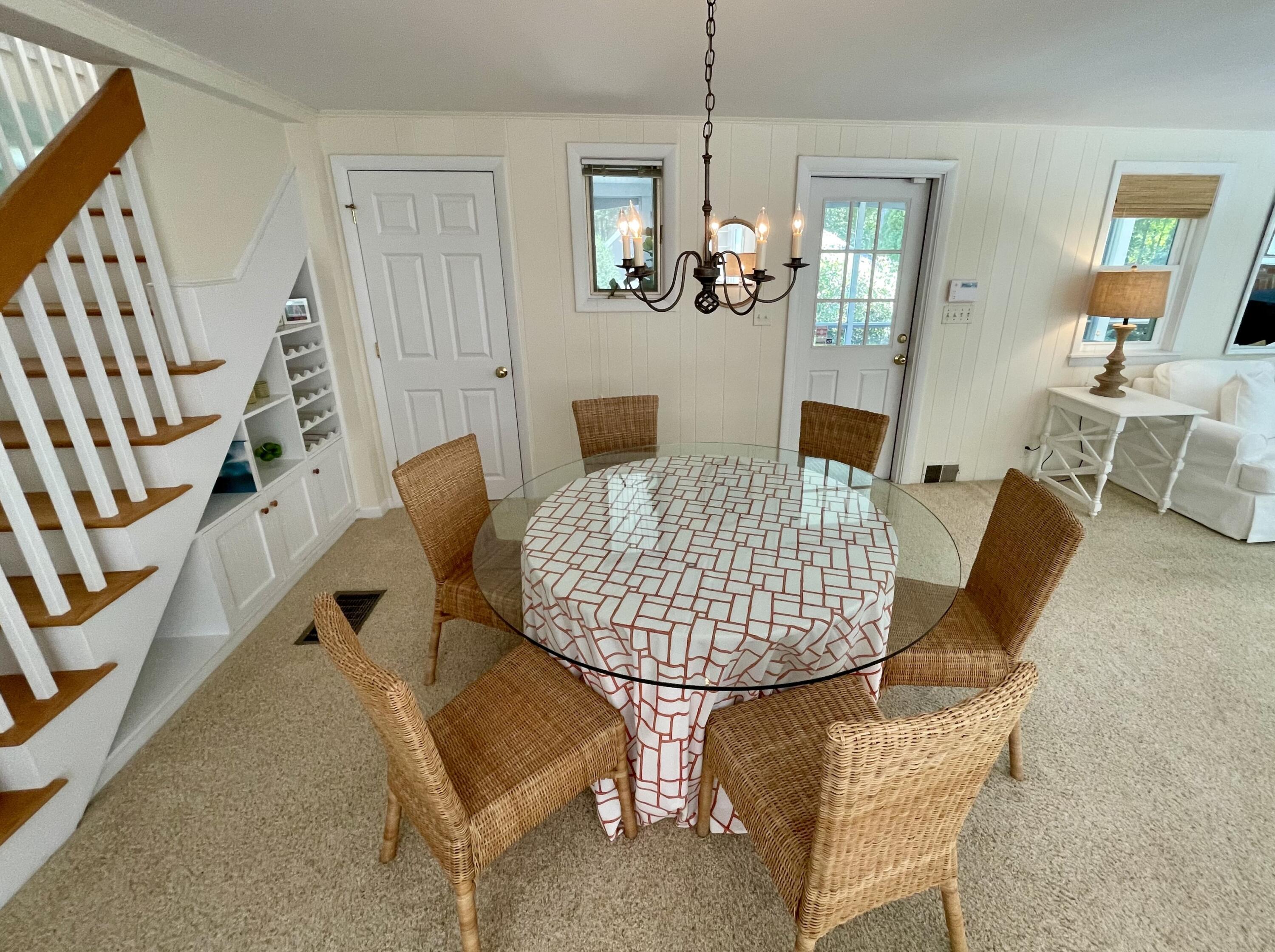 100 Bay Lane Centerville, MA 02632 - Photo 9 of 32 a view of a dining room with furniture