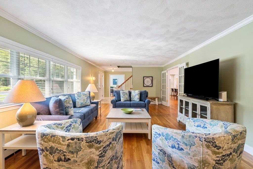 3 Nairn Road Bourne, MA 02559 - Photo 12 of 42 a living room with furniture and a flat screen tv