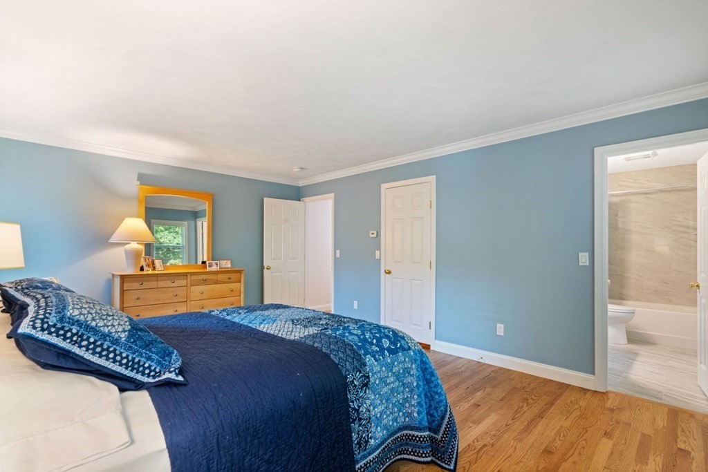 3 Nairn Road Bourne, MA 02559 - Photo 18 of 42 a bedroom with a bed and wooden floor