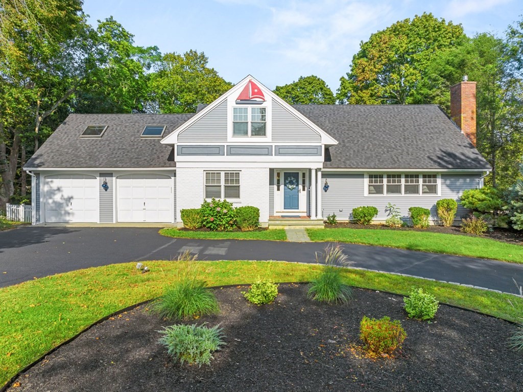 3 Nairn Road Bourne, MA 02559 - Photo 2 of 42 a front view of a house with a yard