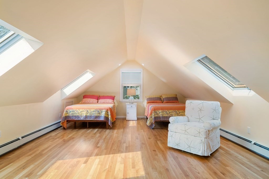3 Nairn Road Bourne, MA 02559 - Photo 24 of 42 a living room with furniture and a wooden floor