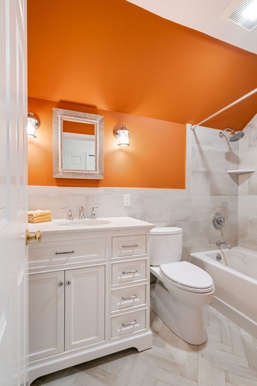 3 Nairn Road Bourne, MA 02559 - Photo 27 of 42 a bathroom with a granite countertop toilet sink and mirror