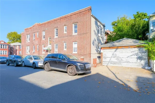 a car parked in front of a house