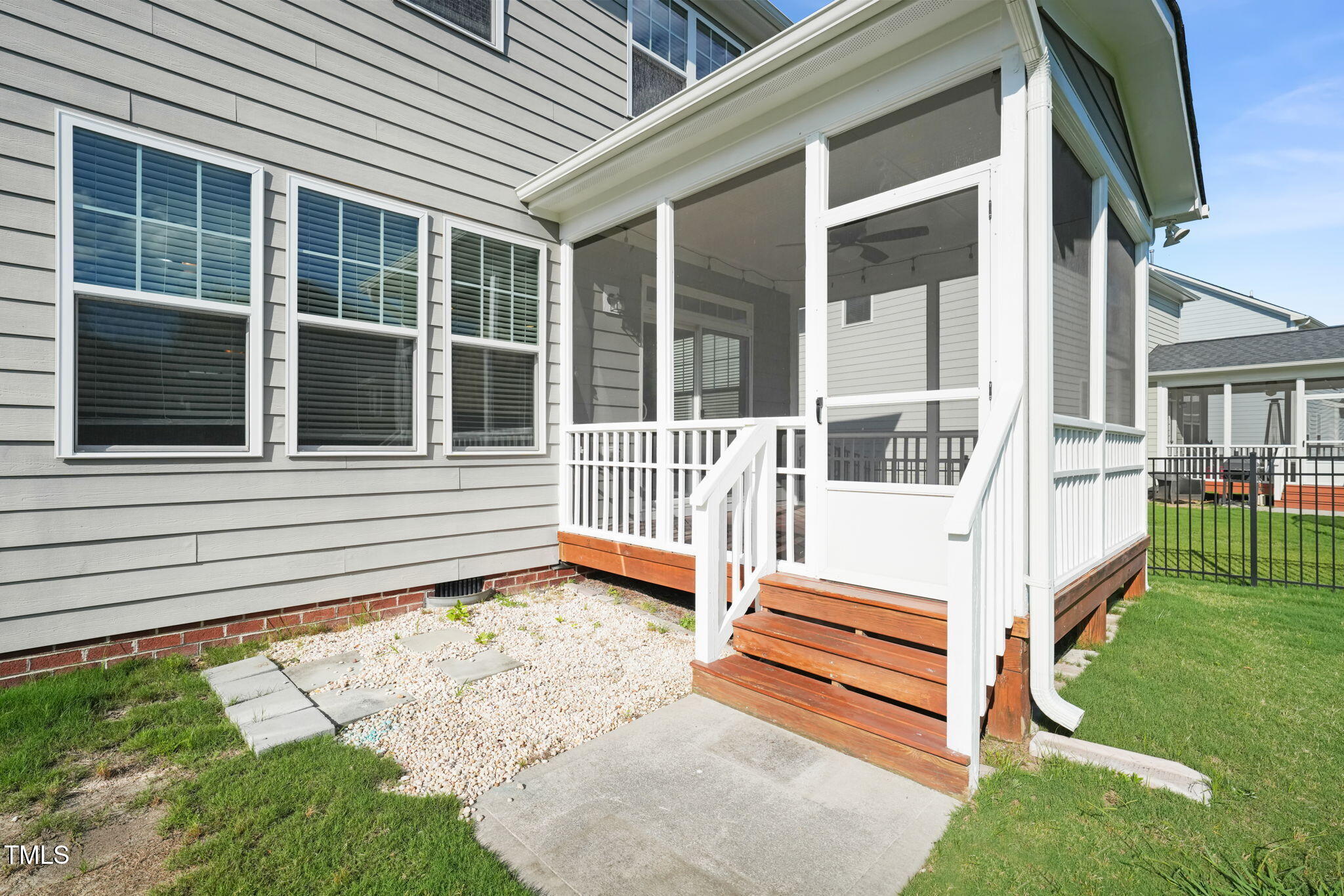 4508 Brintons Cottage Street Raleigh, NC 27616 - Photo 14 of 46 a view of a house with backyard and porch
