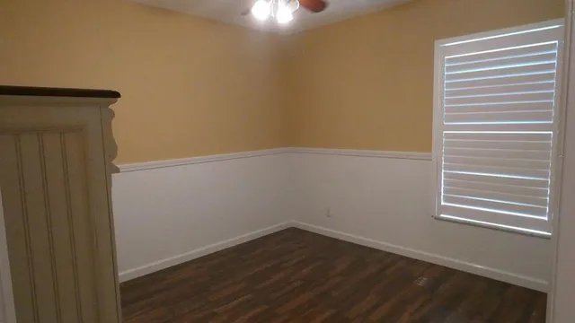 a room with furniture and a window