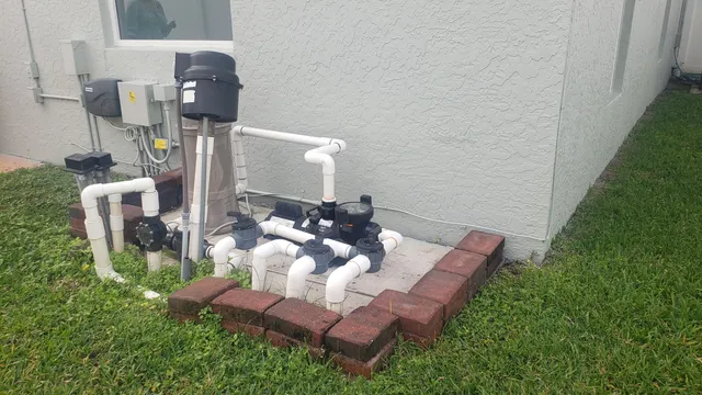 a kitchen with stainless steel appliances granite countertop a refrigerator and a stove