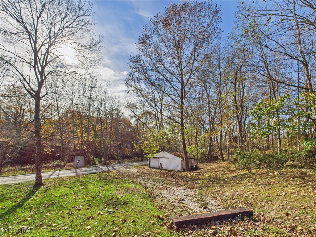 2425 Rocky Point Road Fleming, OH 45729 - Photo 21 of 26 Detached garage/workshop with water