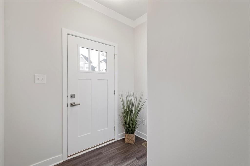 232 Cranesbill Drive Mars, PA 16046 - Photo 3 of 25 a view of a small space with wooden floor and a window