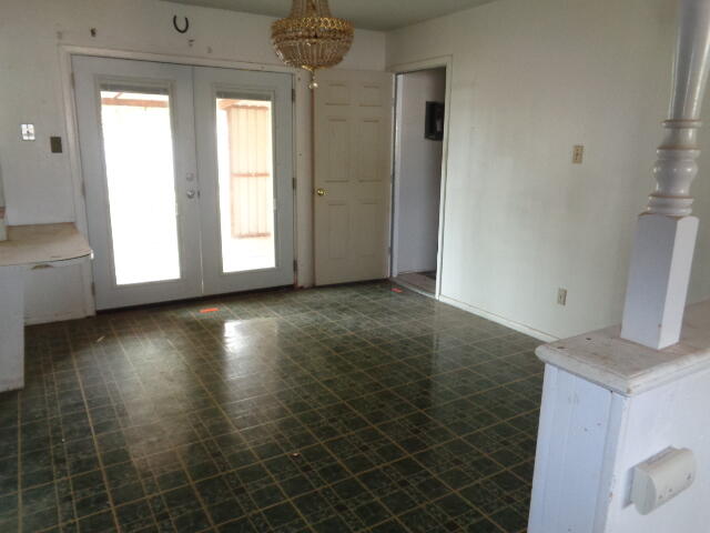 1329 49th Street Lubbock, TX 79412 - Photo 3 of 13 a view of an empty room and window
