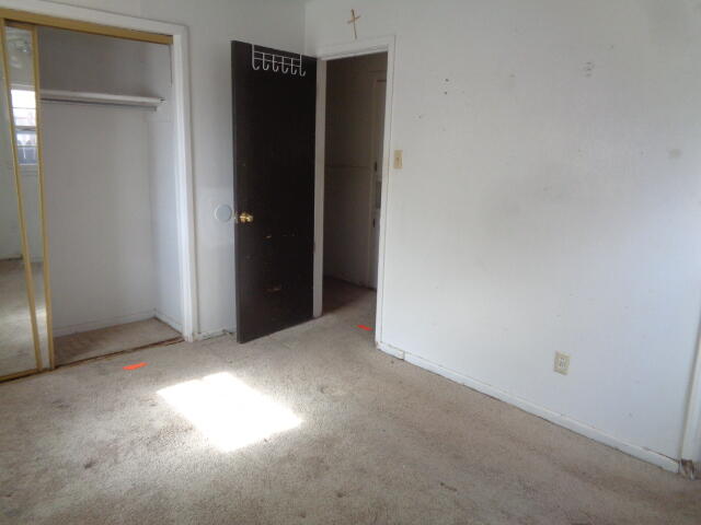 1329 49th Street Lubbock, TX 79412 - Photo 6 of 13 an empty room with closet