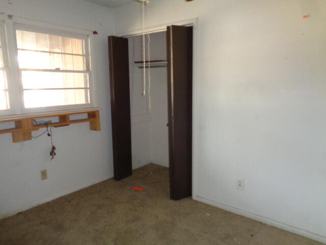 1329 49th Street Lubbock, TX 79412 - Photo 10 of 13 a view of an empty room with a window