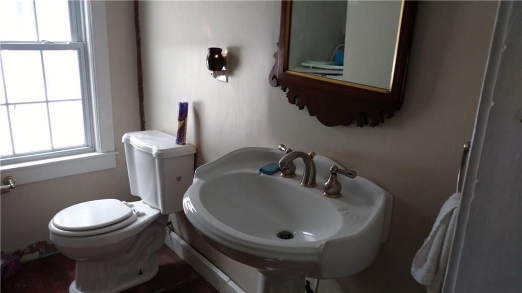 800 Fairbanks Road Farmington, ME 04938 - Photo 15 of 30 Main floor 1/2 bath and laundry hook ups