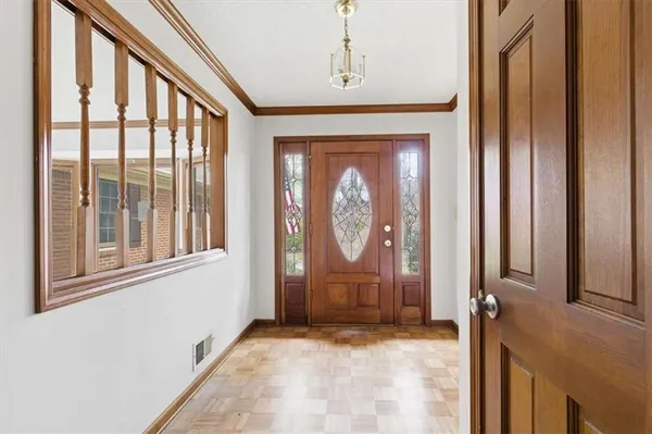 a view of front door with hallway