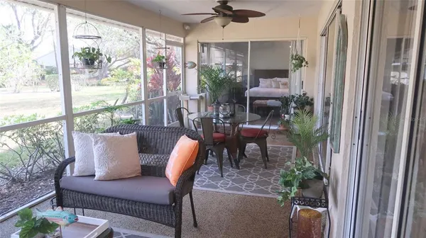 a outdoor living space with furniture and garden view
