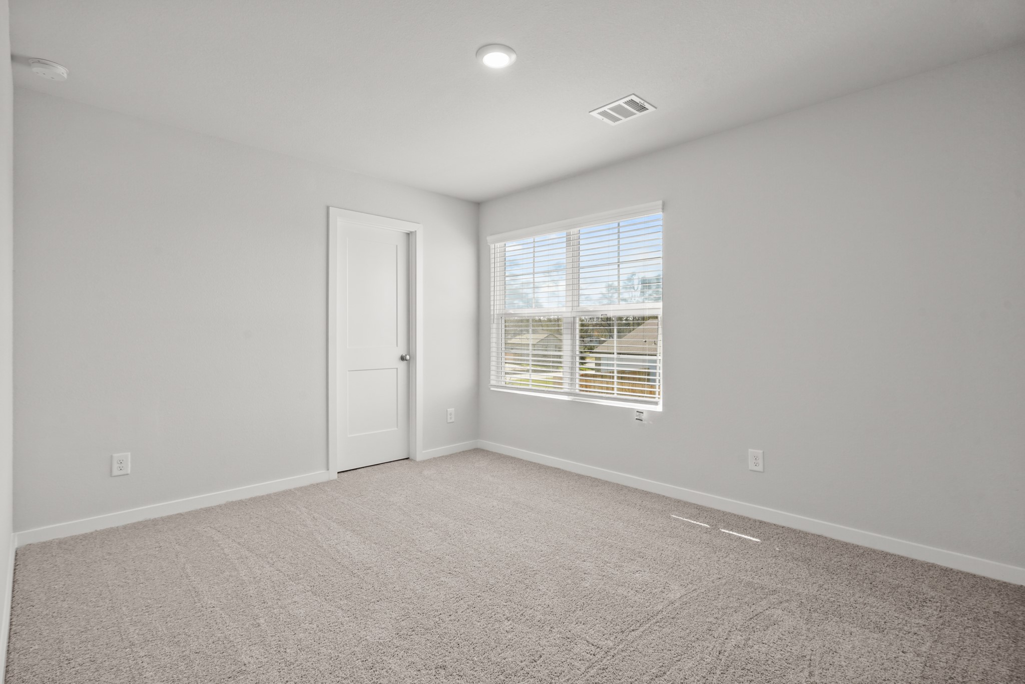9720 Caney Bend Road Conroe, TX 77303 - Photo 13 of 24 an empty room with a window