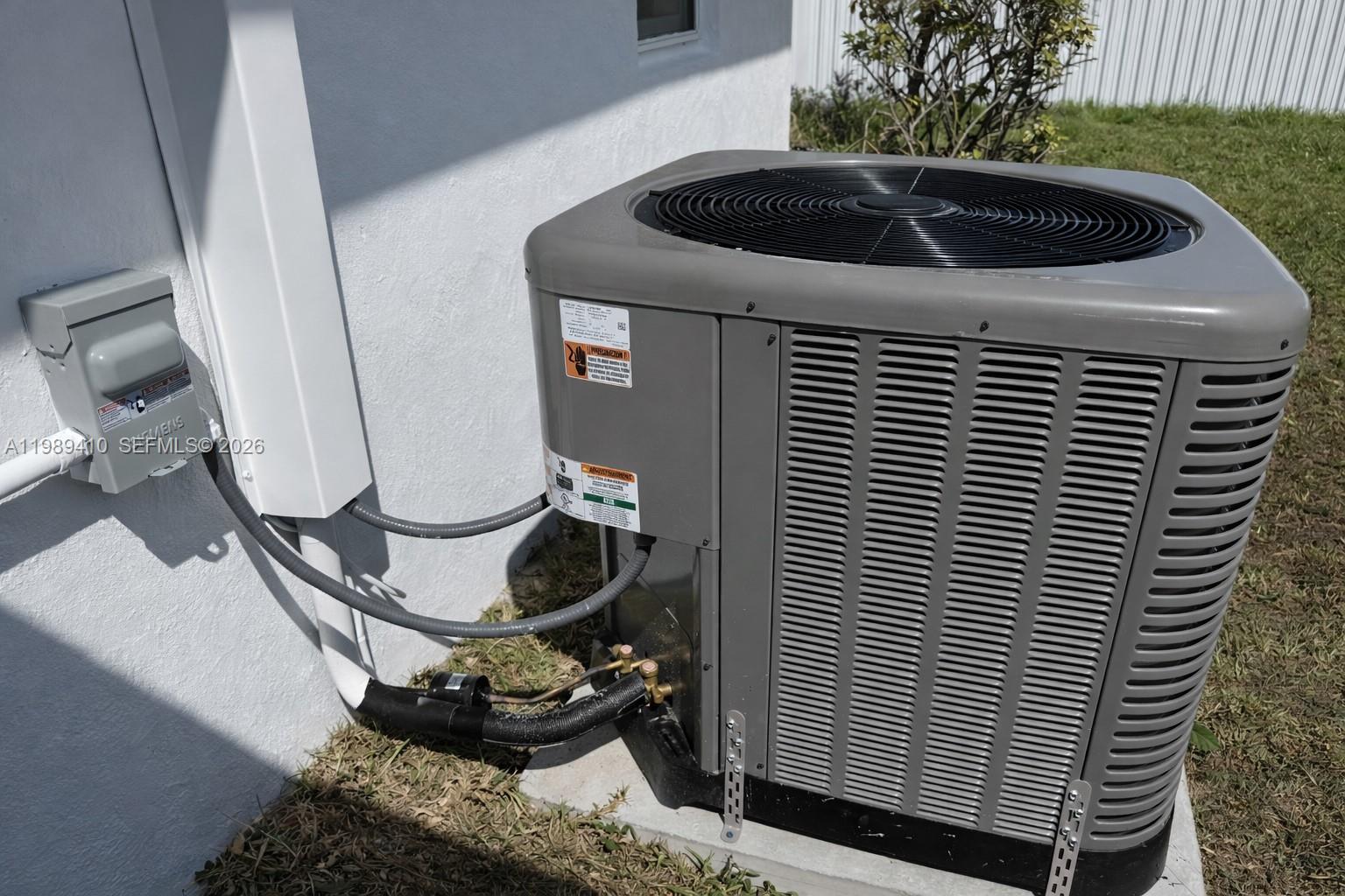 2450 Northwest 157th St Road Miami Gardens, FL 33054 - Photo 16 of 24 a kitchen with a stove and a sink