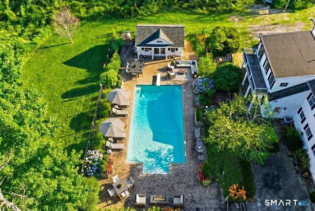an aerial view of a house with a garden