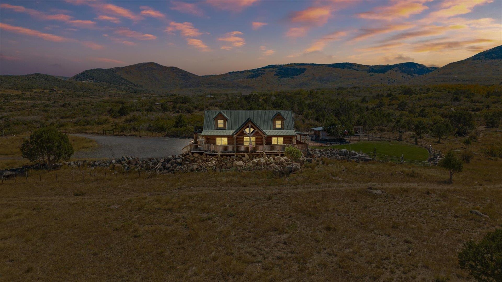 9291 54 Road Molina, CO 81646 - Photo 2 of 36 a view of a town with mountains in the background