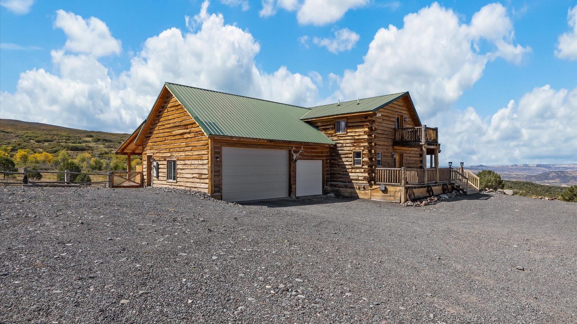 9291 54 Road Molina, CO 81646 - Photo 4 of 36 a view of a house with a yard