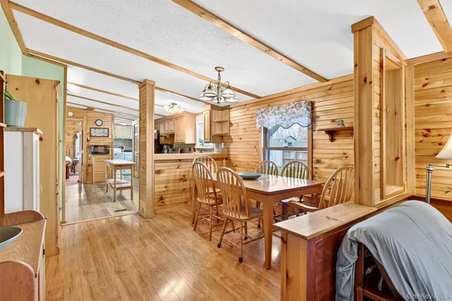 a room with lots of table and chairs