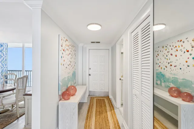a bathroom with a granite countertop sink mirror and toilet