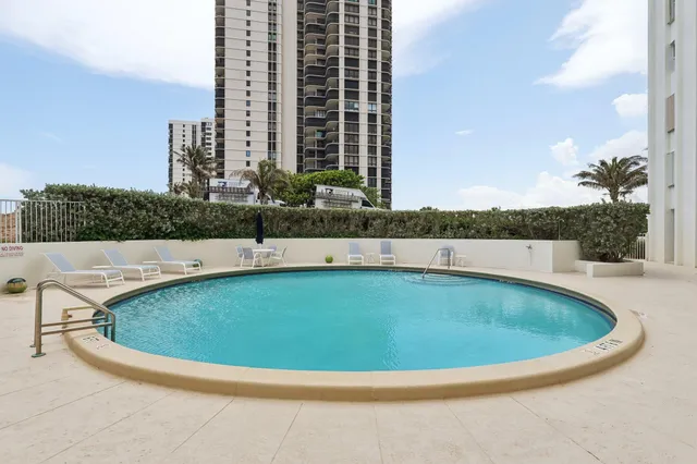 a view of a swimming pool and a outdoor space