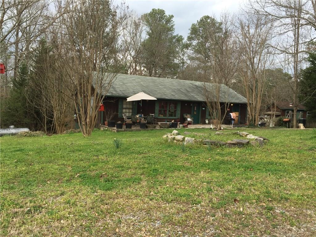 301 Satterfield Road Canton, GA 30114 - Photo 1 of 1 HOUSE HAS 3 BEDROOMS / 1 BATH - 2 STORAGE BUILDINGS / MOBILE HOME HAS 2 BEDROOMS 2 BATHS / 1.31+- ACRES