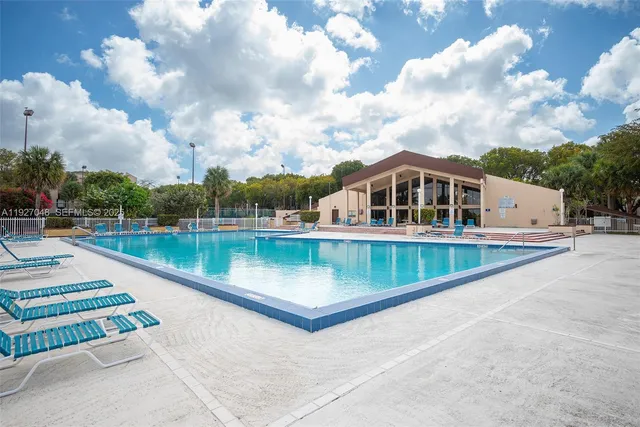 a view of swimming pool with a lake view