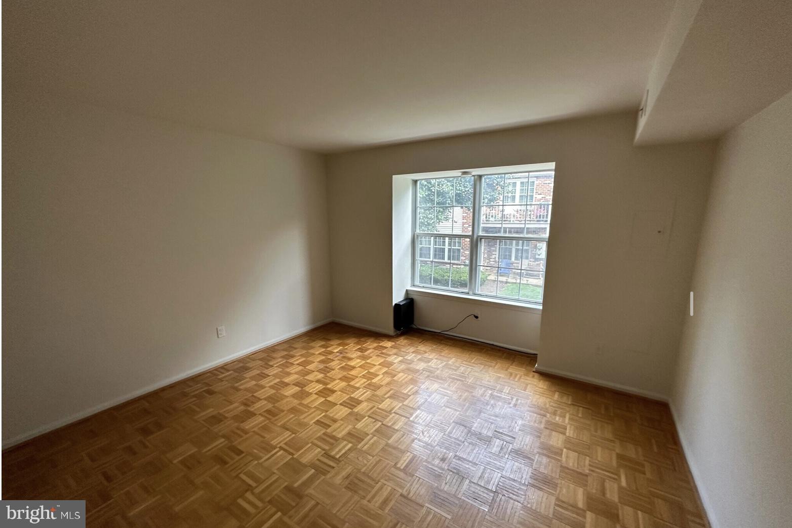 1002 Valley Glen Road, Unit 239 Elkins Park, PA 19027 - Photo 11 of 23 an empty room with windows