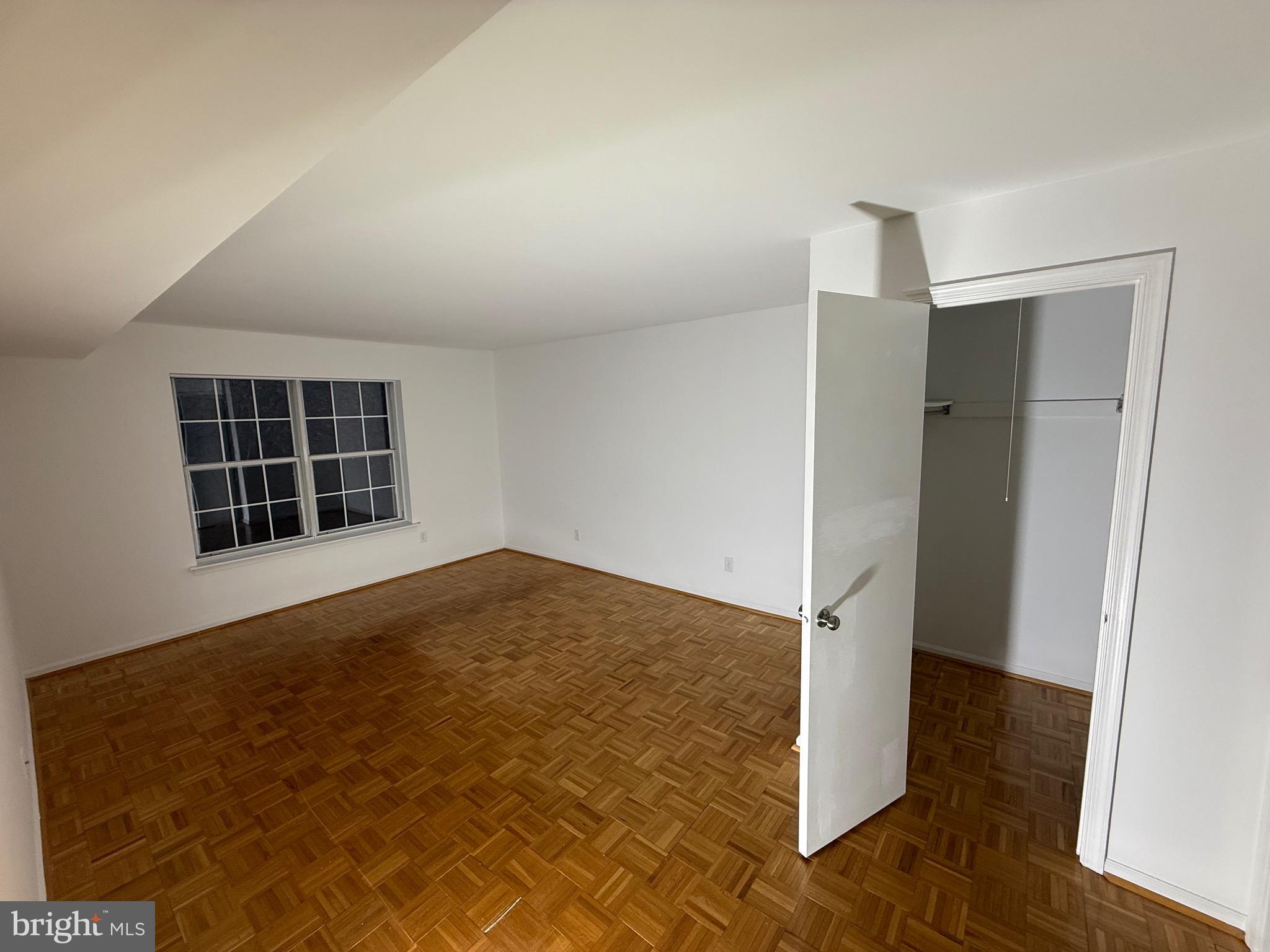 1002 Valley Glen Road, Unit 239 Elkins Park, PA 19027 - Photo 16 of 23 an empty room with windows