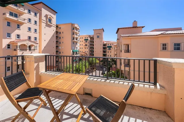 a bedroom with a bed and a table in it