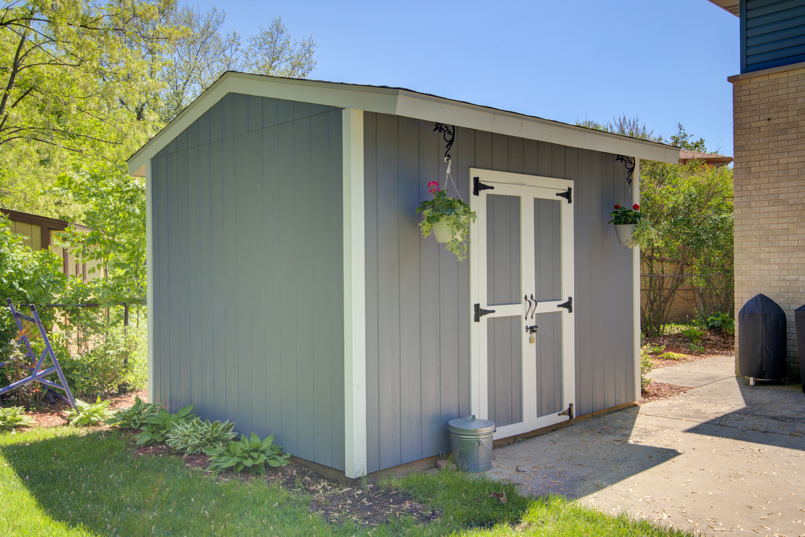272 Scott Street Wheeling, IL 60090 - Photo 23 of 28 a view of a house with a yard and plants