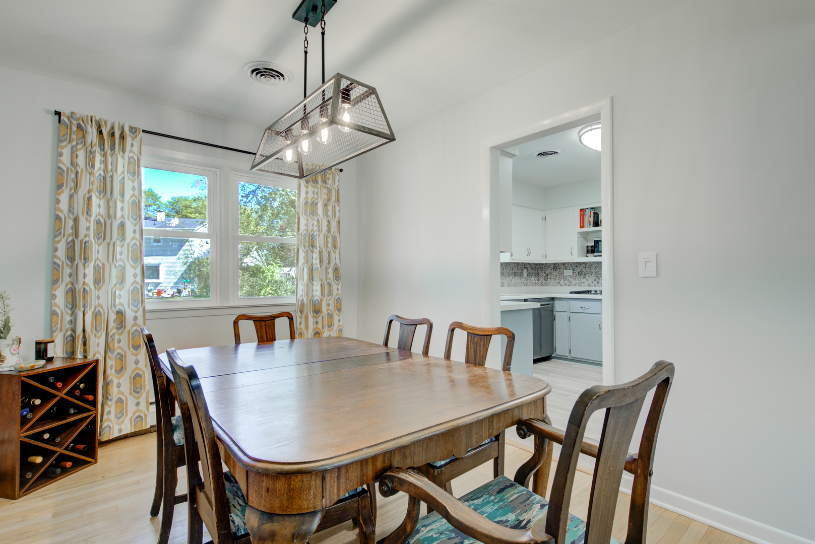 272 Scott Street Wheeling, IL 60090 - Photo 4 of 28 a view of a dining room with furniture window and outside view