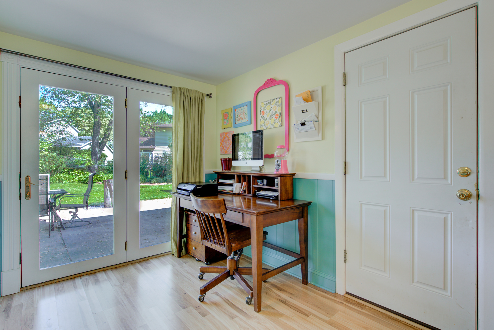 272 Scott Street Wheeling, IL 60090 - Photo 9 of 28 a view of a workspace with furniture and wooden deck