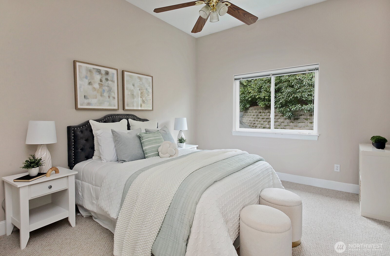 4694 Wrightsman Place Clinton, WA 98236 - Photo 19 of 38 a bedroom with a bed and a window