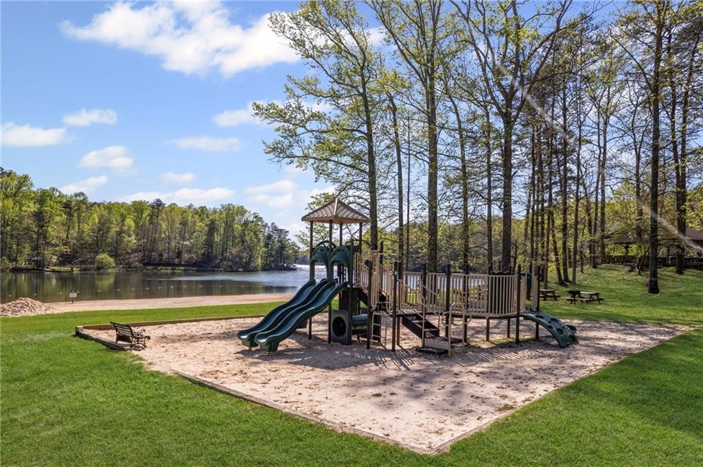 17 Denny Ridge Road Jasper, GA 30143 - Photo 19 of 19 a view of a park with slide and a lake view