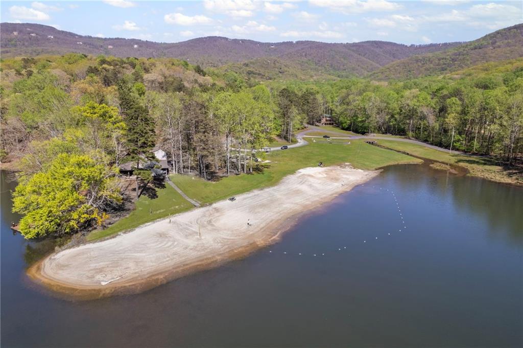 17 Denny Ridge Road Jasper, GA 30143 - Photo 8 of 19 a view of a lush green hillside and a houses